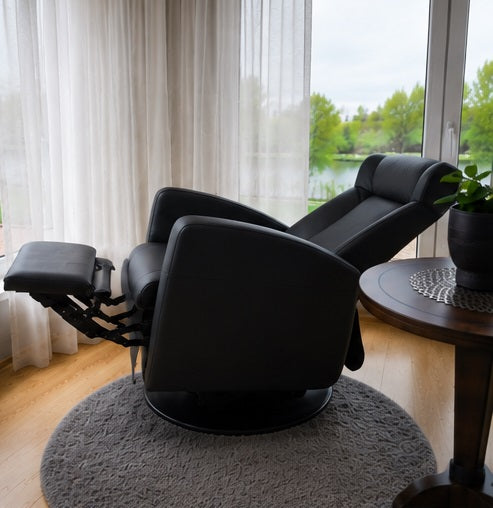 Queen Relex chair in leather with swing and footrest